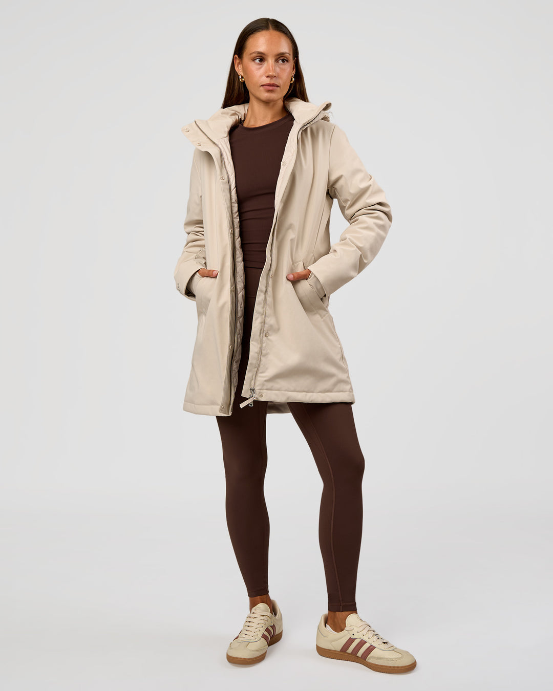 Woman wearing Auxiliary 2.0 Longline Jacket - Shale Beige | Model:Brylee | Size:XS - view 6
