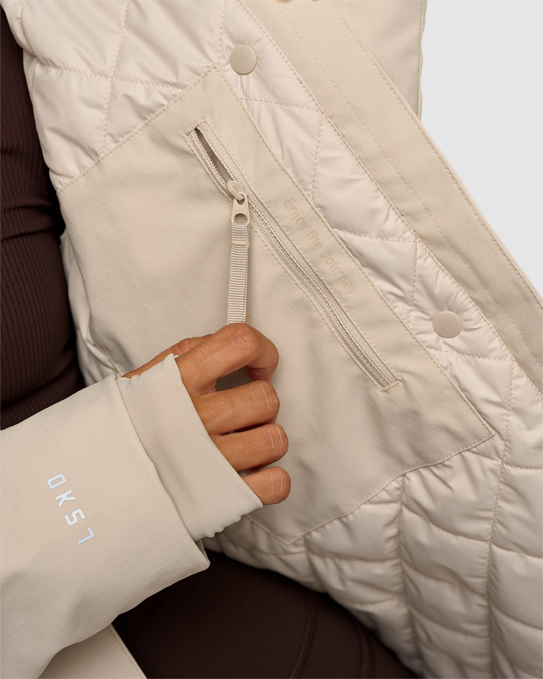 Woman wearing Auxiliary 2.0 Longline Jacket - Shale Beige | Model:Brylee | Size:XS - view 4
