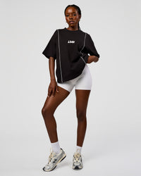 Woman wearing Axis Heavyweight Oversized Boxed Tee - Black-White | Model:Ellie | Size:XS | Thumbnail Index: 4