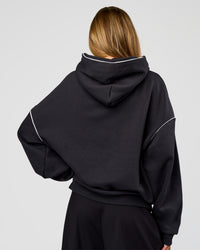 Woman wearing Axis Oversized Hoodie - Caviar-White | Model:Georgia | Size:XS | Thumbnail Index: 7