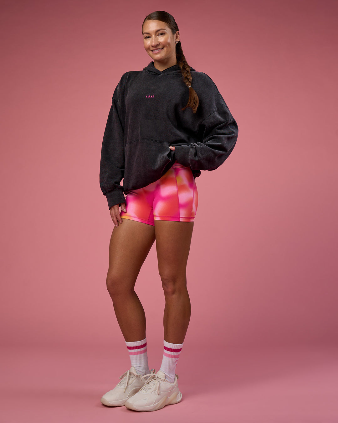 Woman wearing BCAM Washed Unisex Oversized Hoodie - Black Washed-Pink | Model:Hannah | Size:XS - view 10