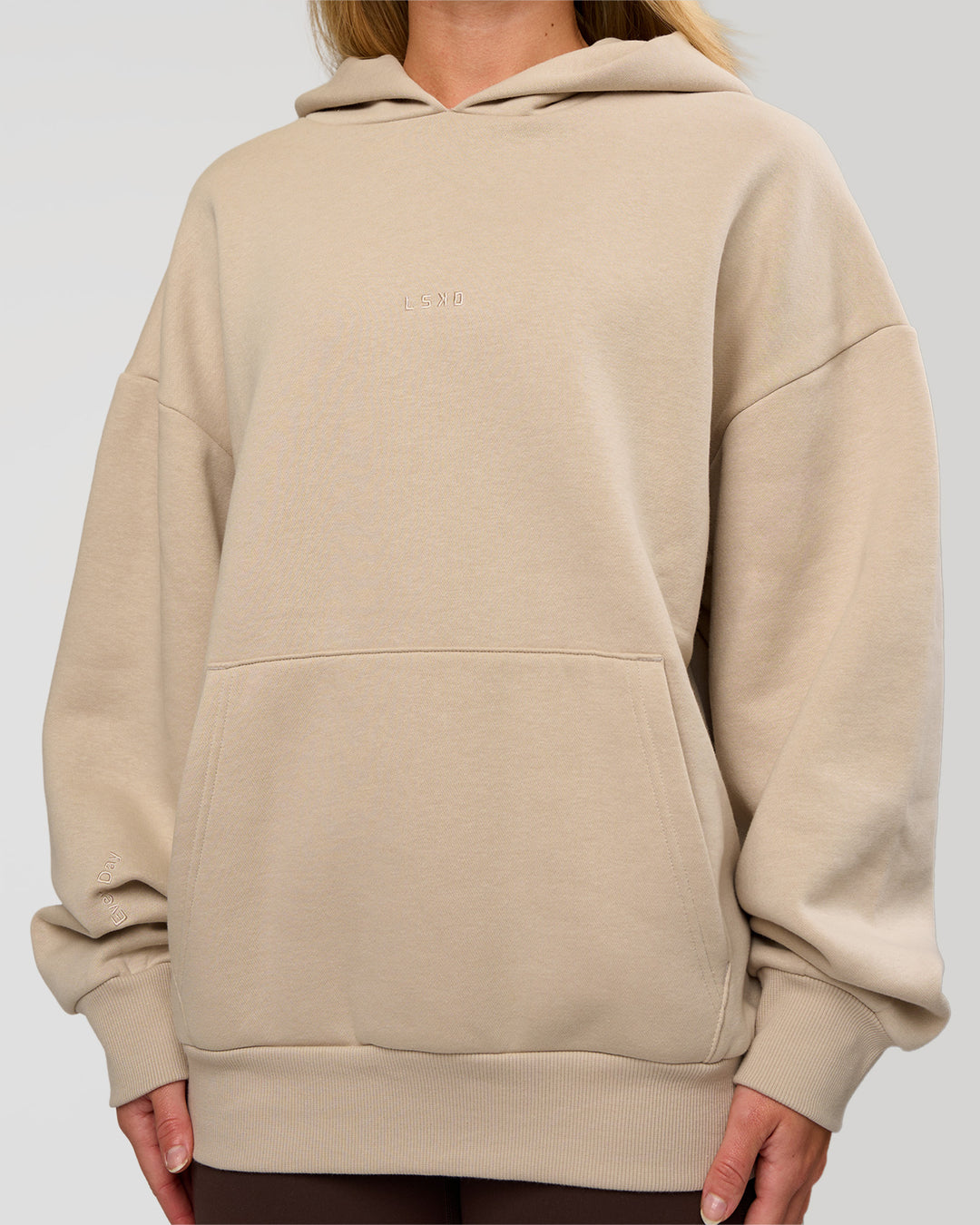 Woman wearing Base Oversized Hoodie - Shale Beige | Model:Issy | Size: XS | - view 9