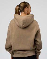 Woman wearing Base Oversized Hoodie - Taupe Ash | Model:Maja | Size:XS | Thumbnail Index: 1
