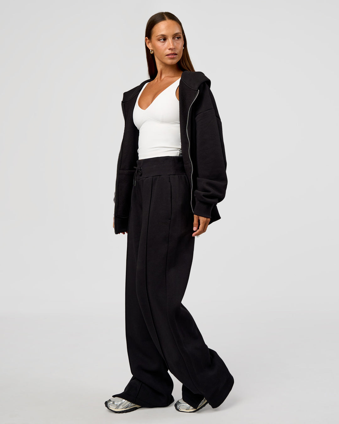 Woman wearing Base Zip Through Oversized Hoodie - Black | Model:Brylee | Size:XS - view 8