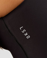Woman wearing Bend & FLX Plunge Tank - Black | Model:Brylee | Size:XS | Thumbnail Index: 7