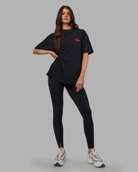 Woman wearing Break Through Heavyweight Oversized Tee - Black Washed-Plum Caspia | Model:Phoebe | Size:XS | Thumbnail Index: 7
