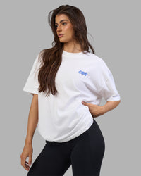 Woman wearing Break Through Heavyweight Oversized Tee - White-Power Cobalt | Model:Phoebe | Size:XS | Thumbnail Index: 4