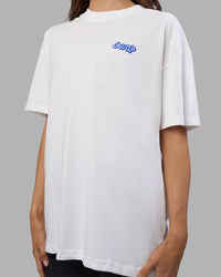 Woman wearing Break Through Heavyweight Oversized Tee - White-Power Cobalt | Model:Phoebe | Size:XS | Thumbnail Index: 8