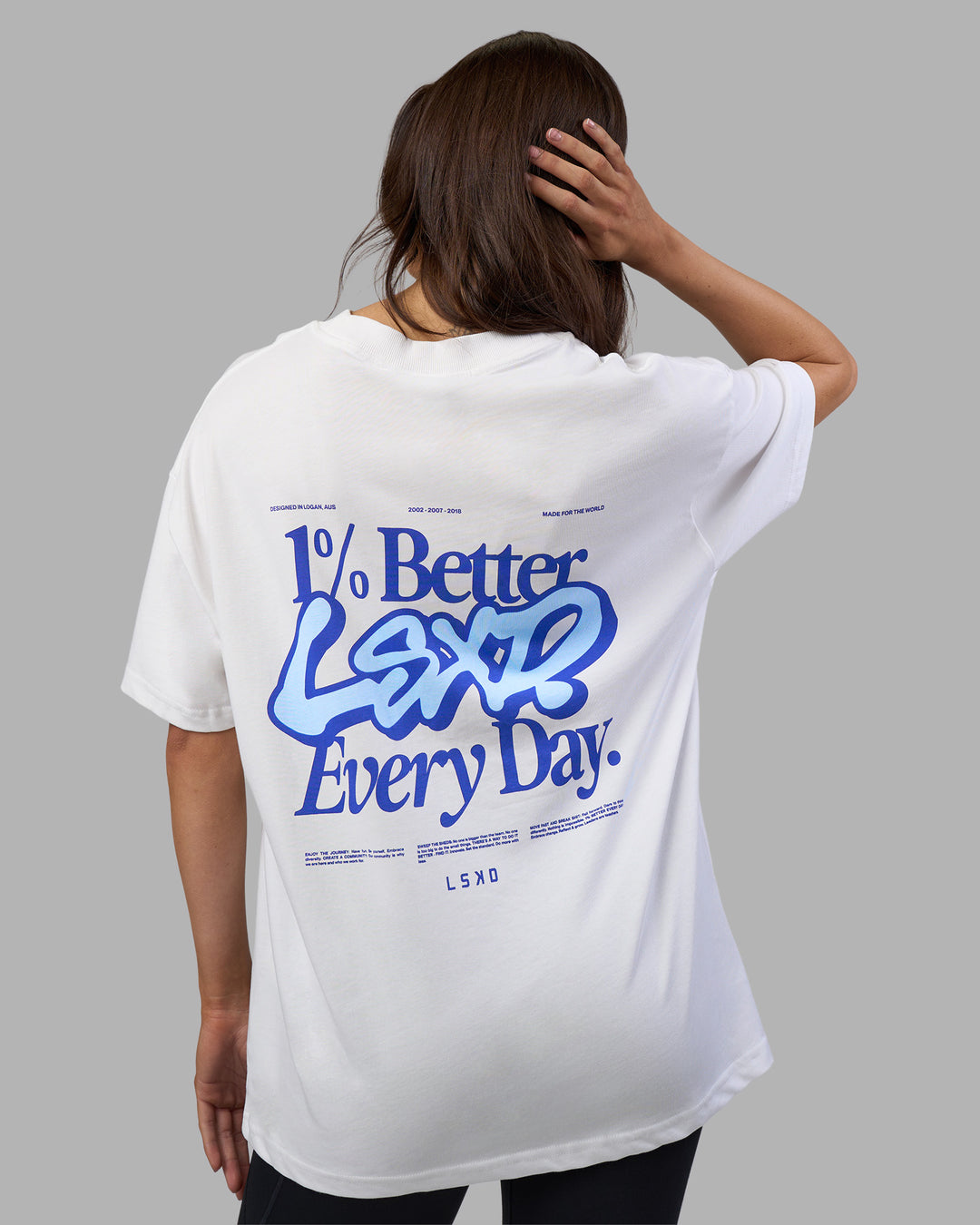Woman wearing Break Through Heavyweight Oversized Tee - White-Power Cobalt | Model:Phoebe | Size:XS - view 4