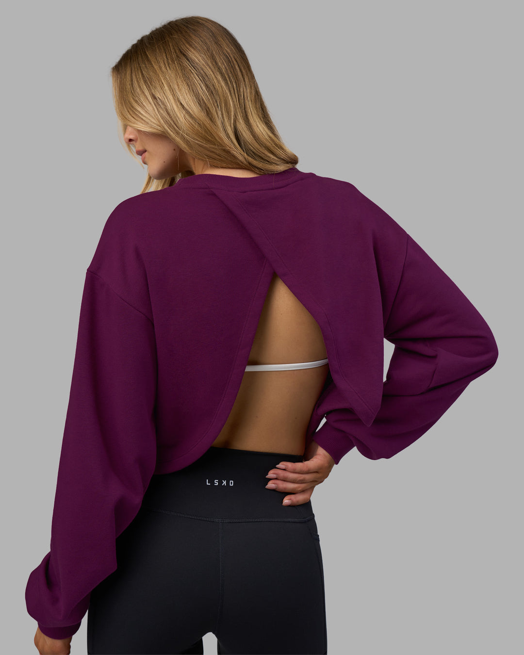 Woman wearing Breeze Open Back Sweater - Plum Caspia-Plum Caspia | Model:Leilani | Size:XS - view 5
