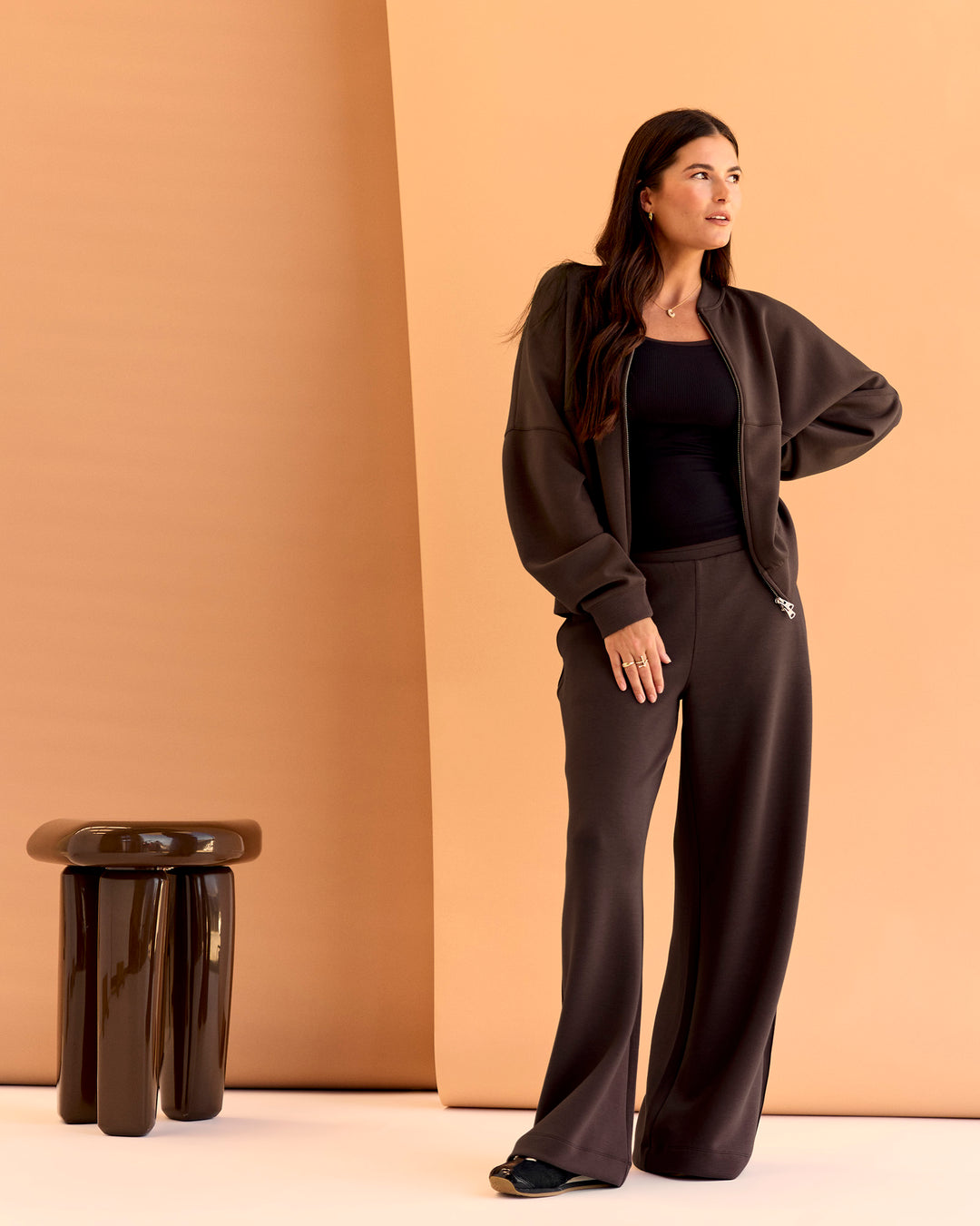 Woman wearing CF Elevate SoftTouch Bomber - Hot Chocolate | Model:Chloe | Size:XS - view 5