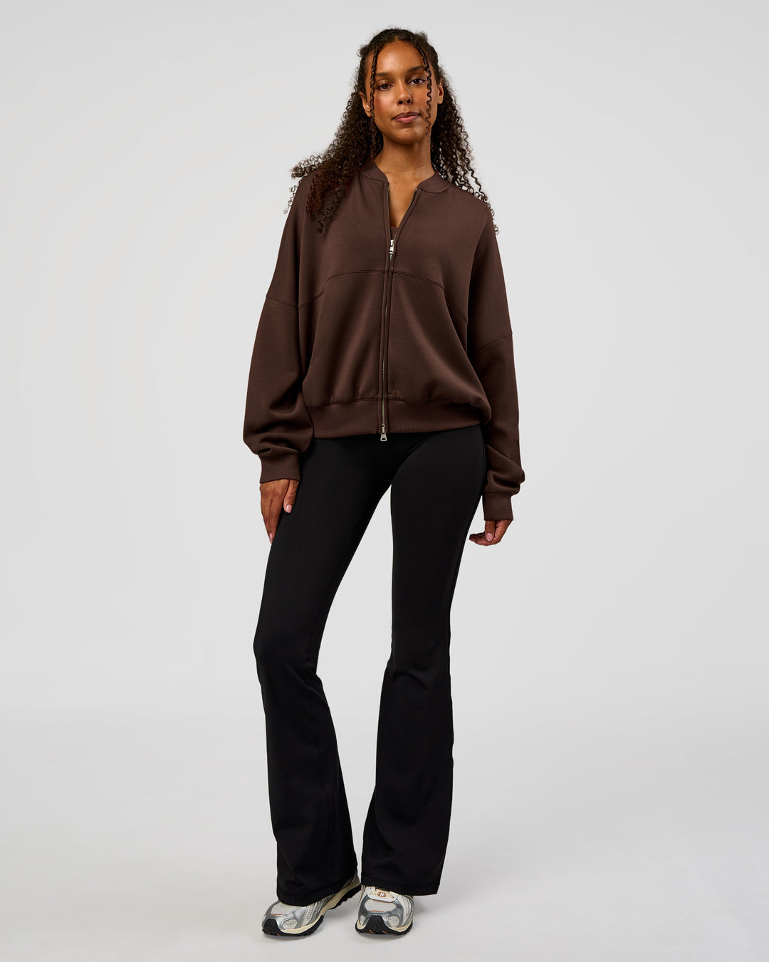 Woman wearing CF Elevate SoftTouch Bomber - Hot Chocolate | Model:Jordan | Size:XS - view 13