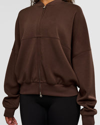 Woman wearing CF Elevate SoftTouch Bomber - Hot Chocolate | Model:Jordan | Size:XS | Thumbnail Index: 5