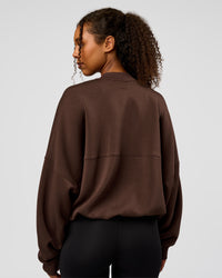Woman wearing CF Elevate SoftTouch Bomber - Hot Chocolate | Model:Jordan | Size:XS | Thumbnail Index: 13