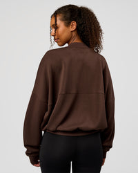 Woman wearing CF Elevate SoftTouch Bomber - Hot Chocolate | Model:Jordan | Size:XS | Thumbnail Index: 1