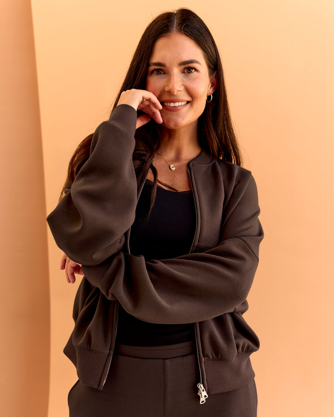 Woman wearing CF Elevate SoftTouch Bomber - Hot Chocolate | Model:Chloe | Size:XS - view 8