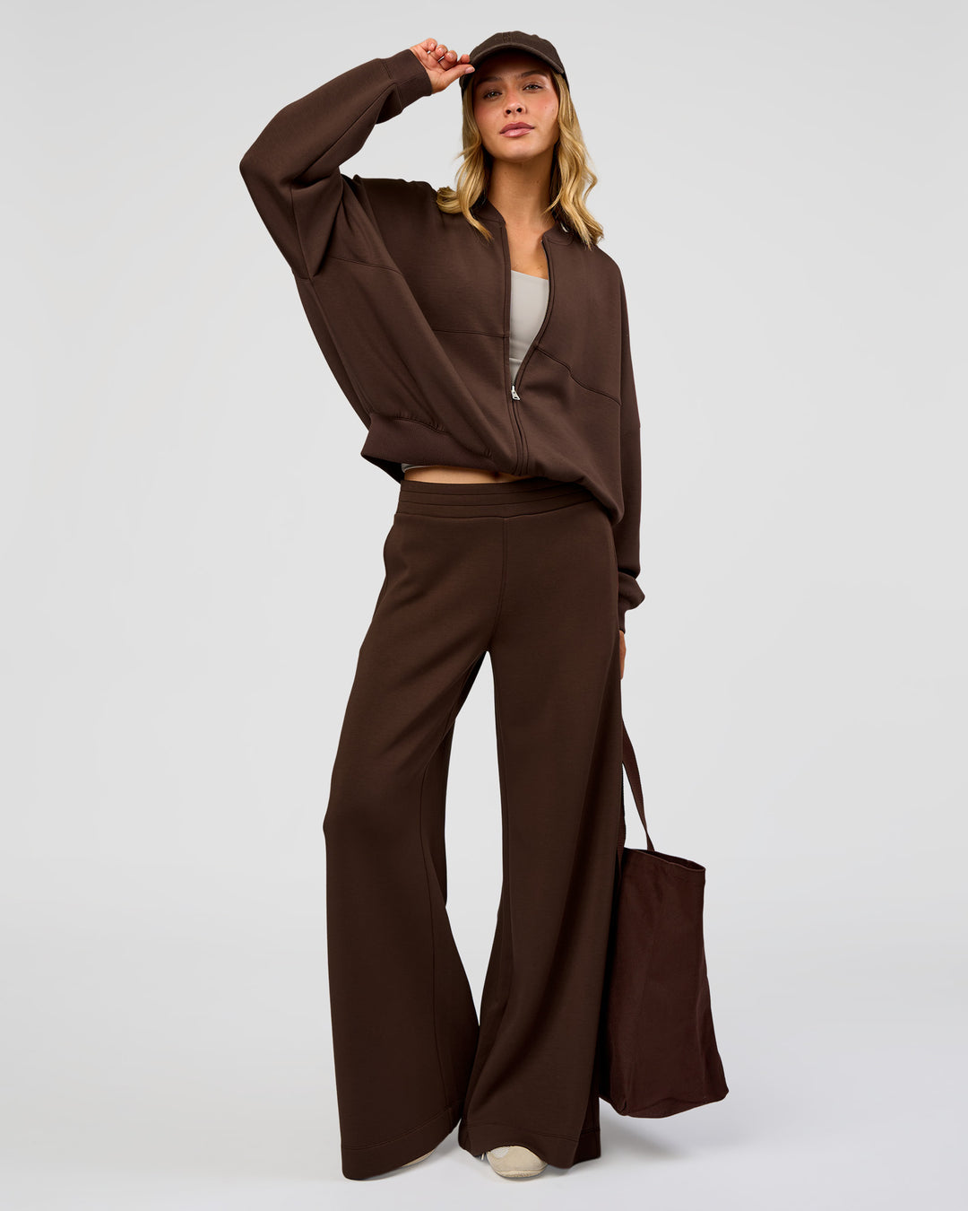 Woman wearing CF Elevate SoftTouch Bomber - Hot Chocolate | Model:Leilani | Size:XS - view 12