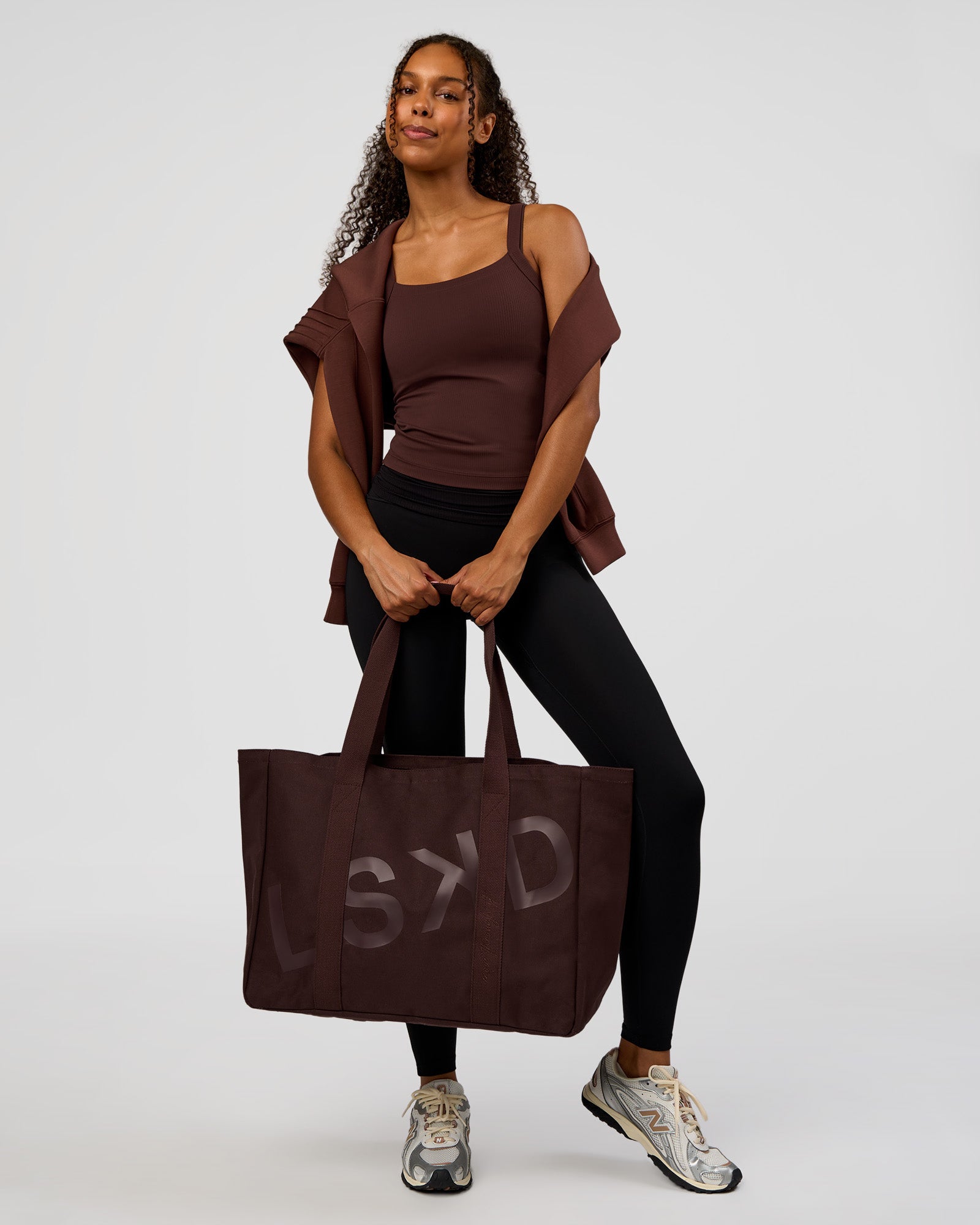 Woman wearing CF Move Through It Rib Tank - Hot Chocolate | Model:Jordan | Size:XS