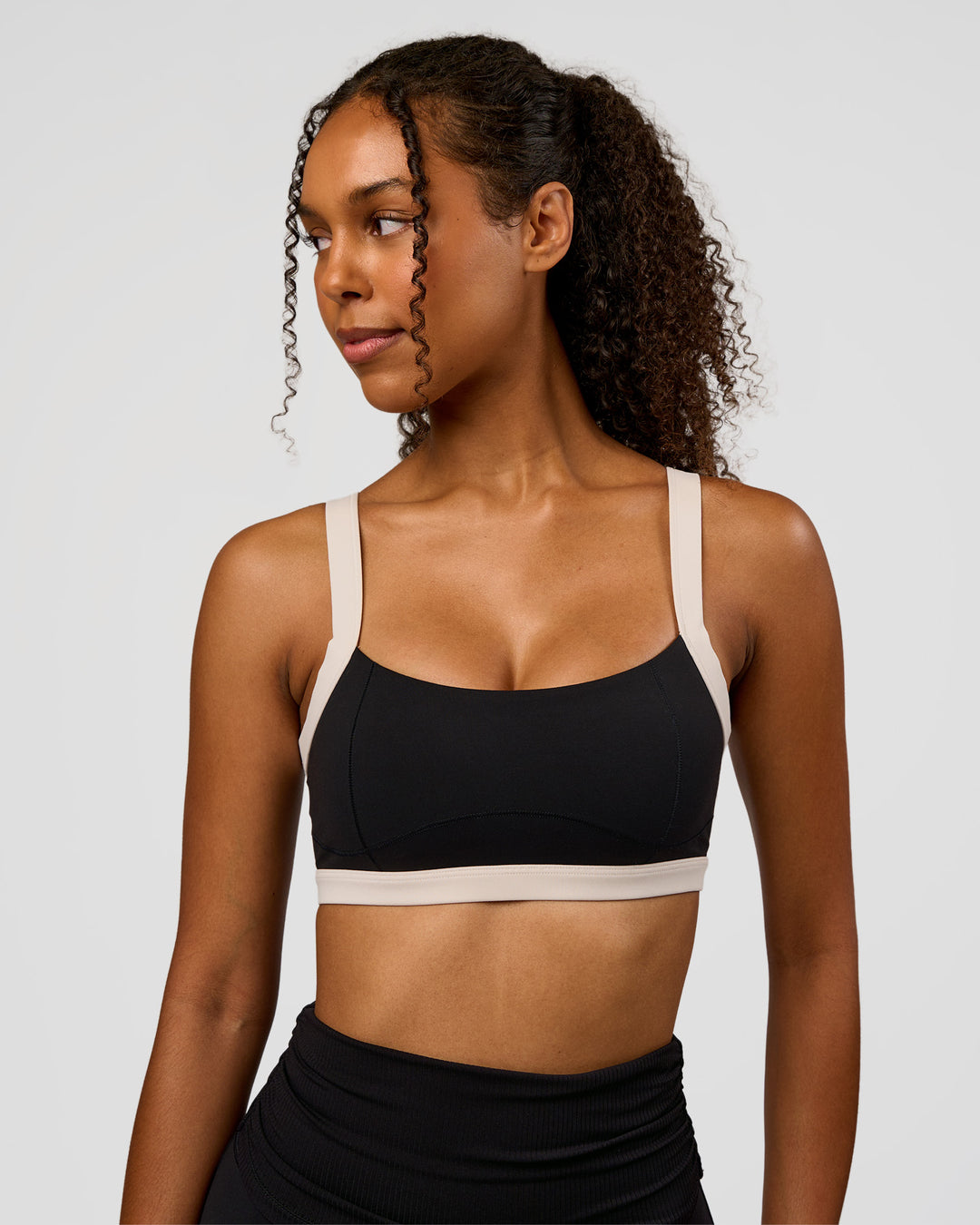 Woman wearing CF Move Through It Sports Bra - Black-Clay | Model:Jordan | Size:XS - view 9