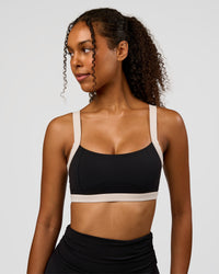 Woman wearing CF Move Through It Sports Bra - Black-Clay | Model:Jordan | Size:XS | Thumbnail Index: 8