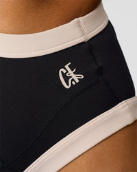 Woman wearing CF Move Through It Sports Bra - Black-Clay | Model:Jordan | Size:XS | Thumbnail Index: 2