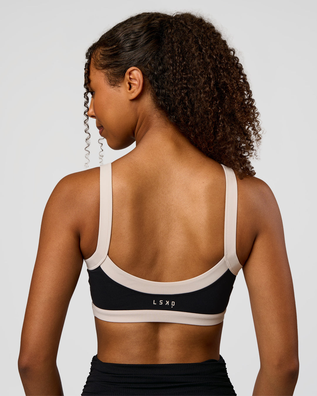 Woman wearing CF Move Through It Sports Bra - Black-Clay | Model:Jordan | Size:XS - view 10