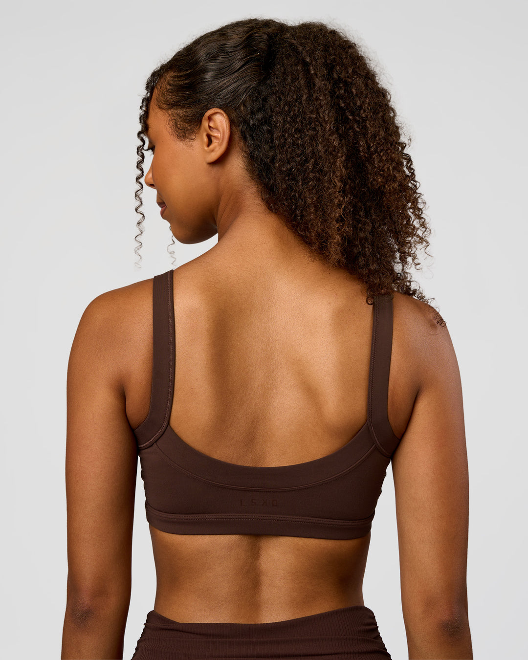 Woman wearing CF Move Through It Sports Bra - Hot Chocolate | Model:Jordan | Size:XS - view 2