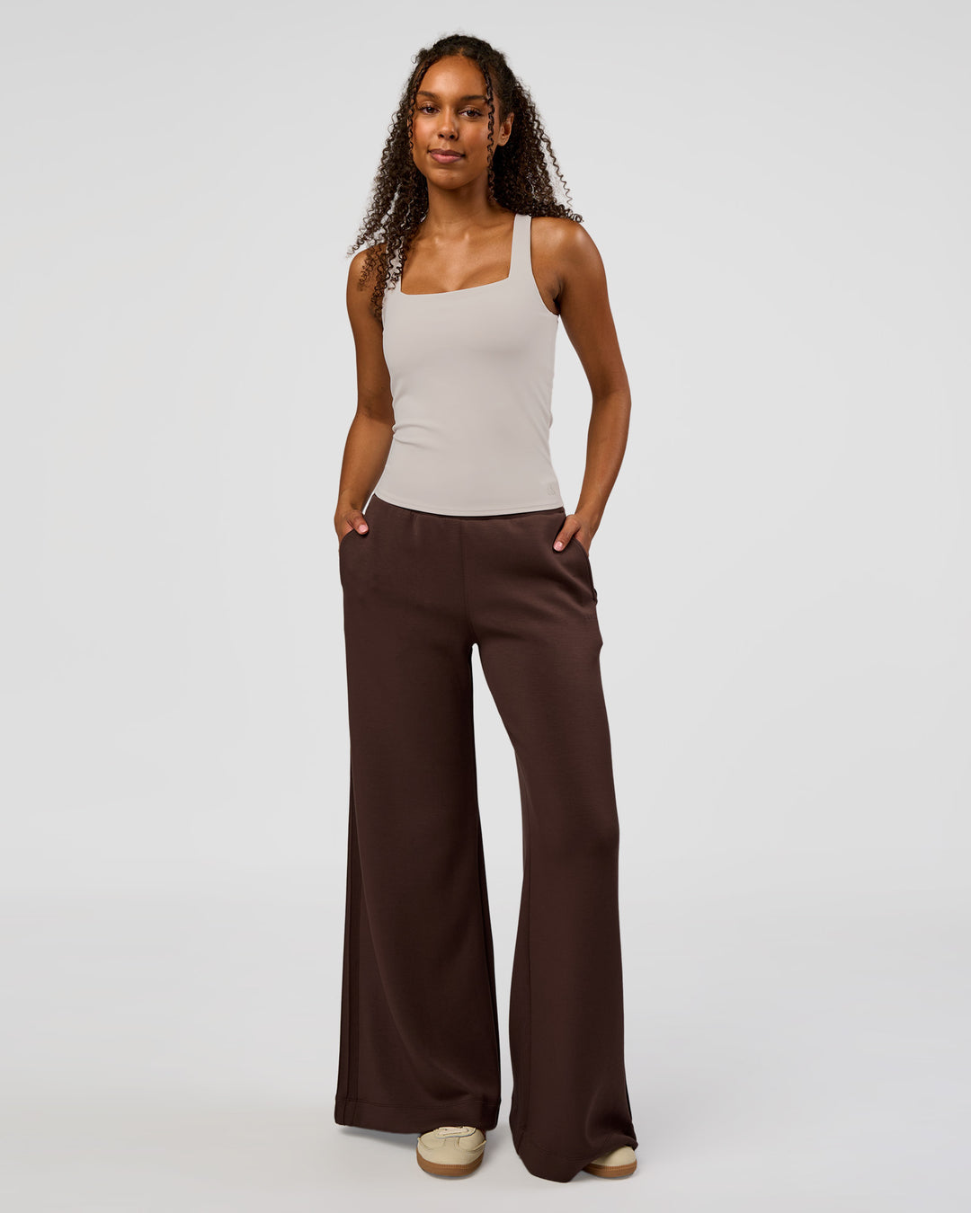 Woman wearing CF Train Hard Shelf Bra Tank - Clay | Model:Jordan | Size:XS - view 1