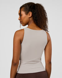 Woman wearing CF Train Hard Shelf Bra Tank - Clay | Model:Jordan | Size:XS | Thumbnail Index: 1
