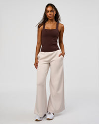 Woman wearing CF Train Hard Shelf Bra Tank - Hot Chocolate | Model:Jordan | Size:XS | Thumbnail Index: 2
