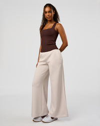 Woman wearing CF Train Hard Shelf Bra Tank - Hot Chocolate | Model:Jordan | Size:XS | Thumbnail Index: 6