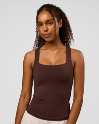 Woman wearing CF Train Hard Shelf Bra Tank - Hot Chocolate | Model:Jordan | Size:XS | Thumbnail Index: 0