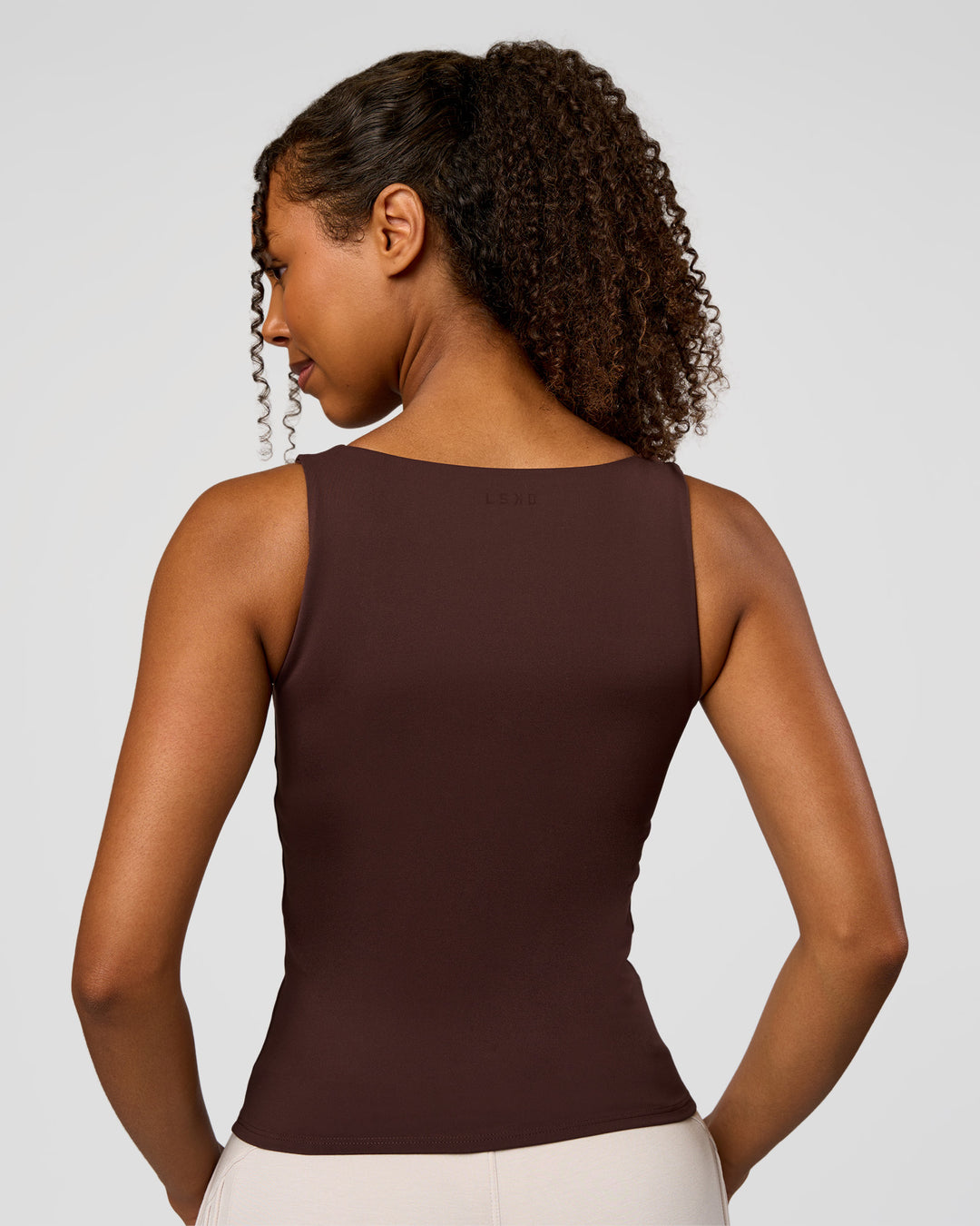 Woman wearing CF Train Hard Shelf Bra Tank - Hot Chocolate | Model:Jordan | Size:XS - view 5