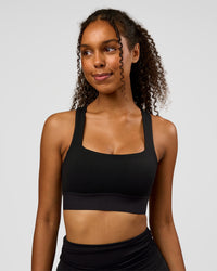 Woman wearing CF Train Hard Sports Bra - Black | Model:Jordan | Size:XS | Thumbnail Index: 9
