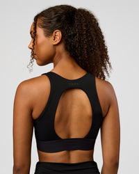 Woman wearing CF Train Hard Sports Bra - Black | Model:Jordan | Size:XS | Thumbnail Index: 2
