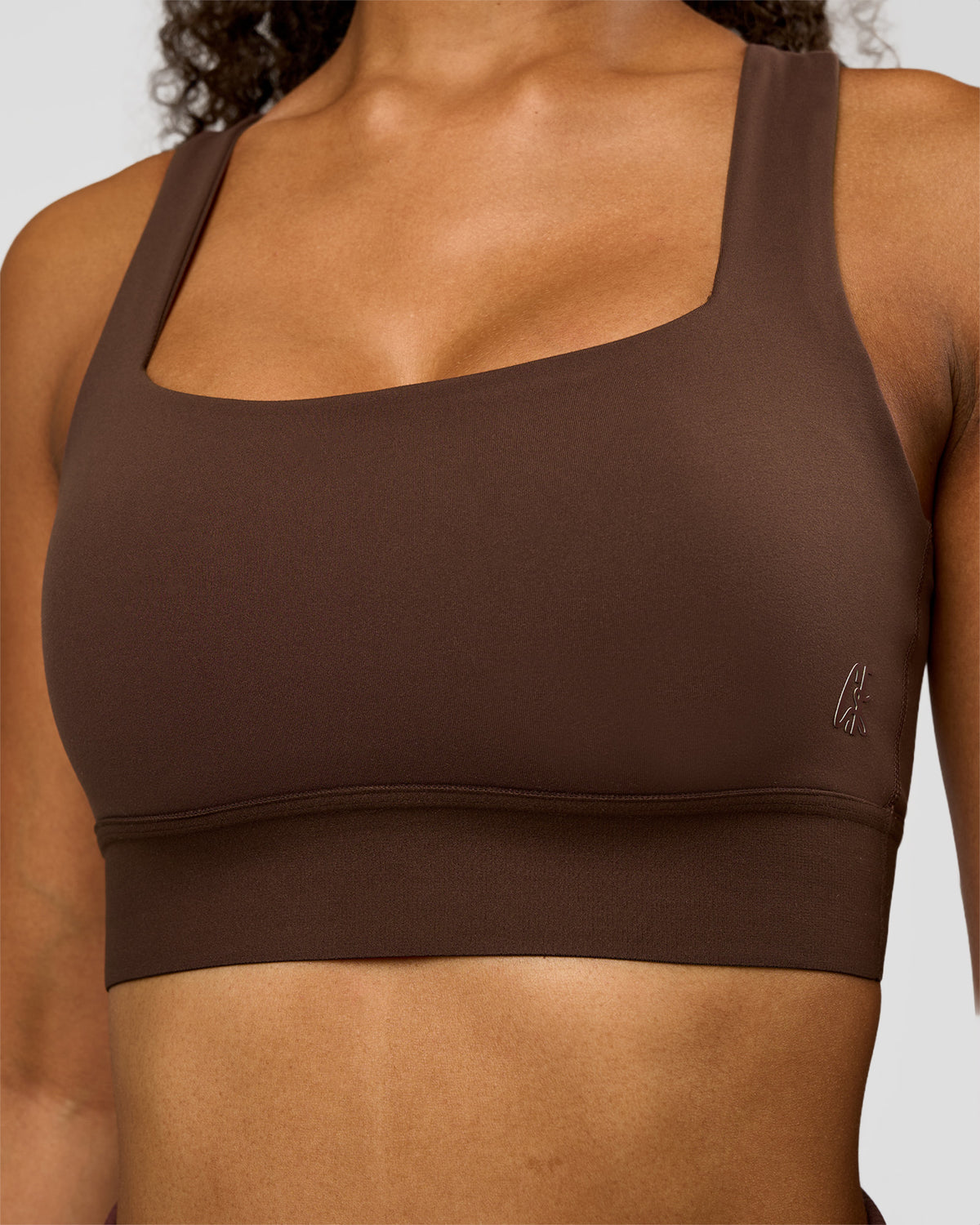 Woman wearing CF Train Hard Sports Bra - Hot Chocolate | Model:Jordan | Size:XS