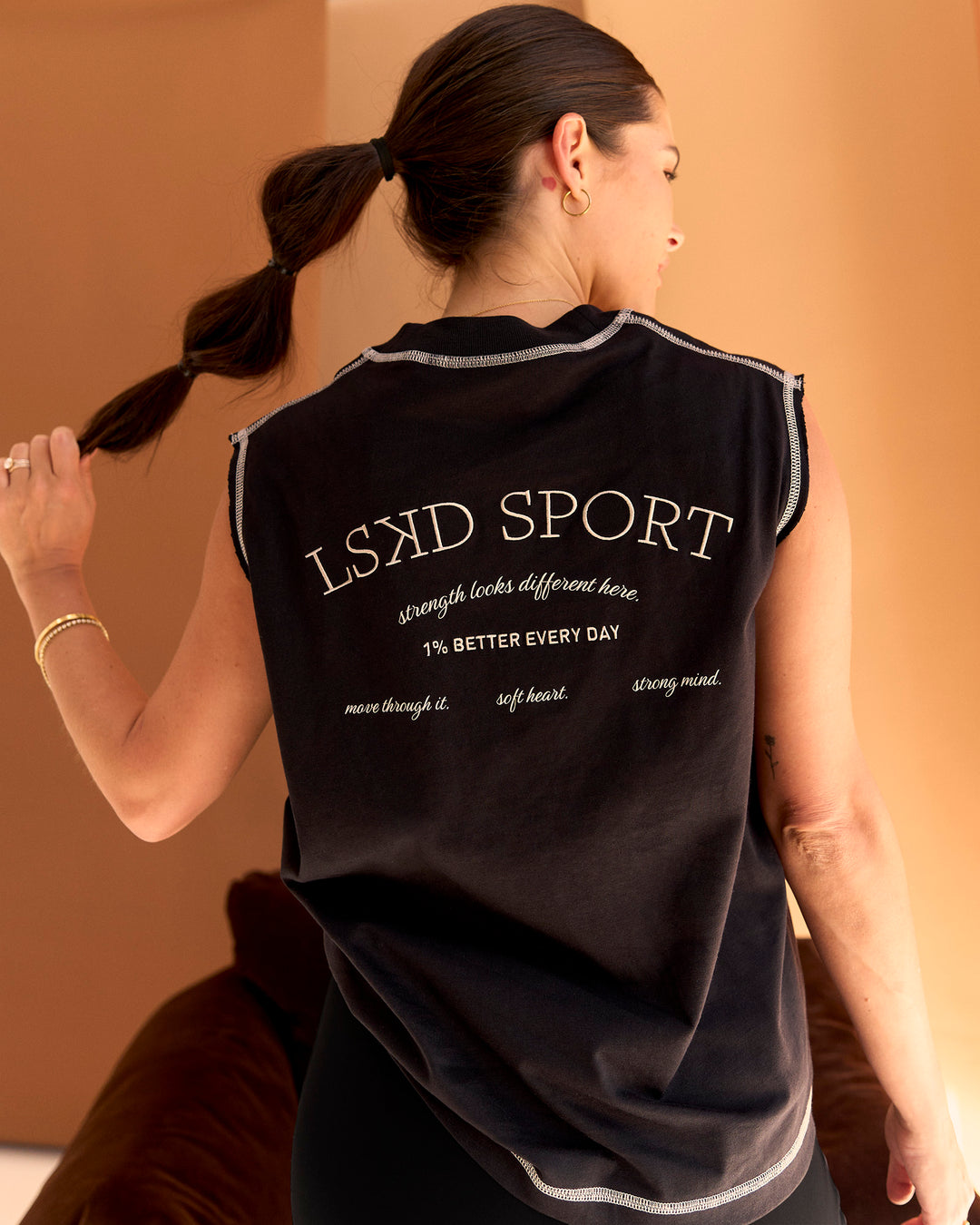Woman wearing CF Unisex Oversized Heavyweight Boxed Tank - Black-CF X LSKD Sport | Model:Chloe | Size:XS - view 3