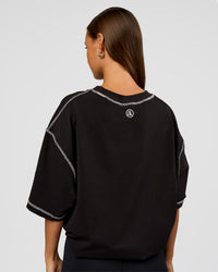 Woman wearing CF Unisex Oversized Heavyweight FLXCotton Tee - Black-CF Move Through It | Model:Brylee | Size:XS | Thumbnail Index: 6