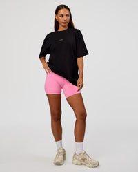 Woman wearing CFT BNE 26 FLXCotton Oversized Tee in Black | Model:Brylee | Size:XS | Thumbnail Index: 8