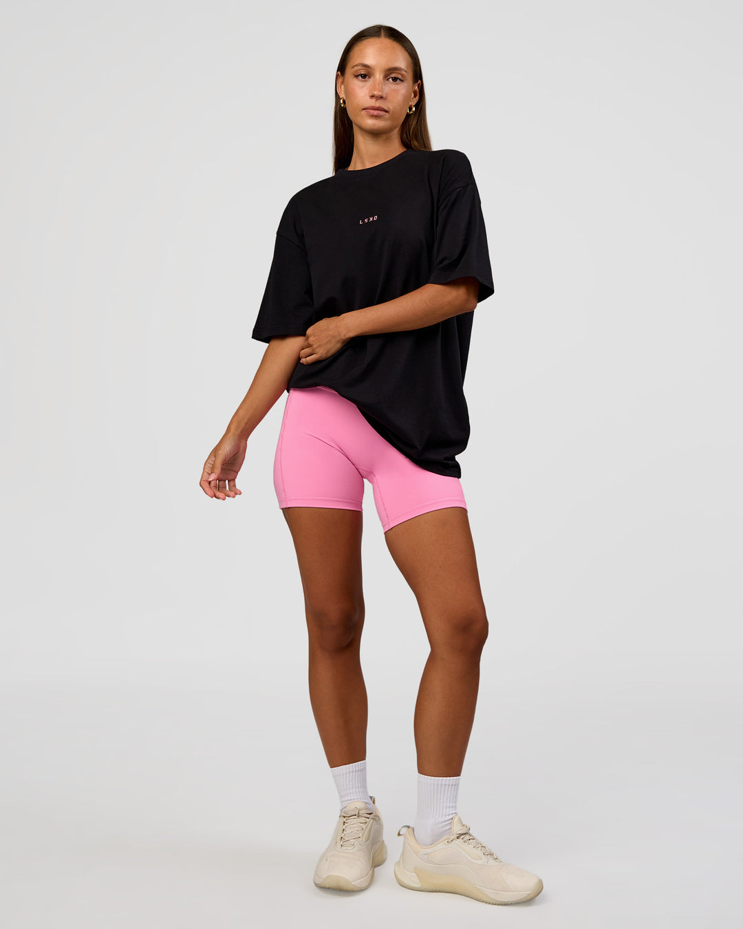 Woman wearing CFT BNE 26 FLXCotton Oversized Tee in Black | Model:Brylee | Size:XS - view 10