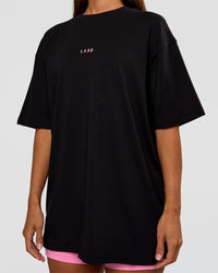 Woman wearing CFT BNE 26 FLXCotton Oversized Tee in Black | Model:Brylee | Size:XS | Thumbnail Index: 10