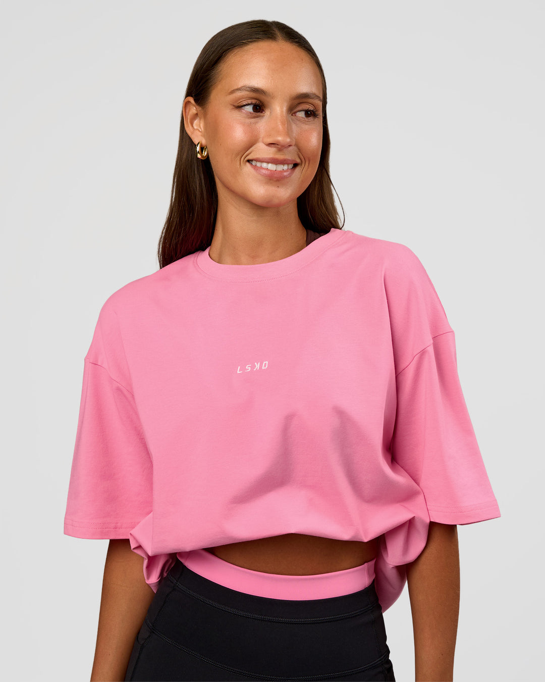 Woman wearing CFT BNE 26 FLXCotton Oversized Tee in Candy Pink | Model:Brylee | Size:XS - view 4