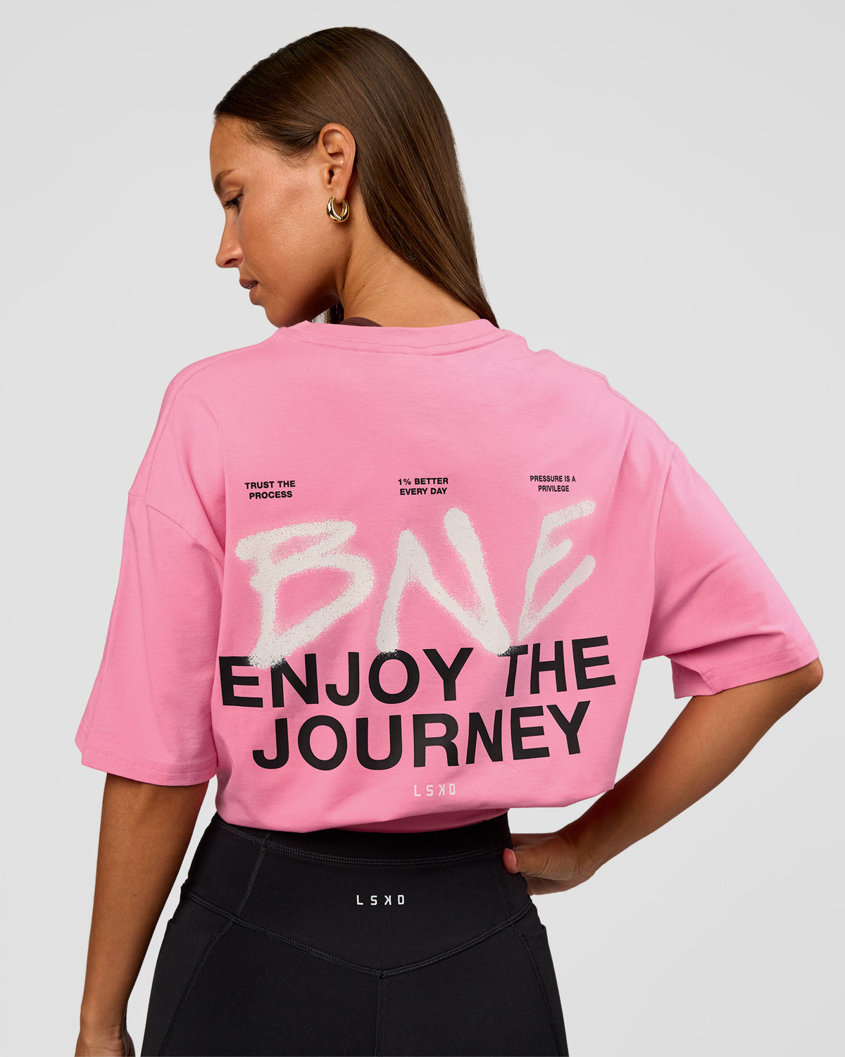 Woman wearing CFT BNE 26 FLXCotton Oversized Tee in Candy Pink | Model:Brylee | Size:XS