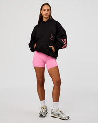 Woman wearing CFT BNE 26 Unisex Oversized Hoodie - Black-Candy Pink | Model:Brylee | Size:XS | Thumbnail Index: 9