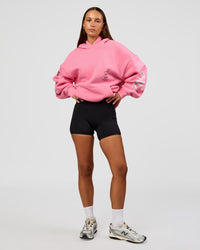Woman wearing CFT BNE 26 Unisex Oversized Hoodie - Candy Pink-Black | Model:Brylee | Size:XS | Thumbnail Index: 3