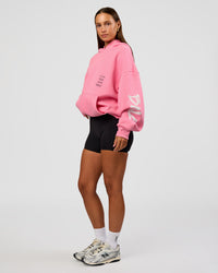 Woman wearing CFT BNE 26 Unisex Oversized Hoodie - Candy Pink-Black | Model:Brylee | Size:XS | Thumbnail Index: 8