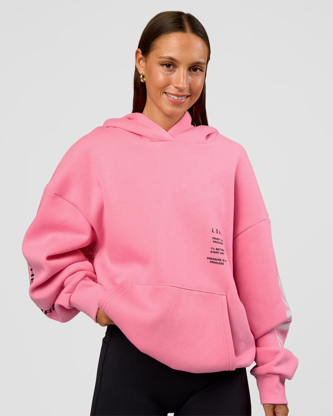 Woman wearing CFT BNE 26 Unisex Oversized Hoodie - Candy Pink-Black | Model:Brylee | Size:XS - view 5