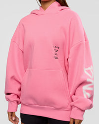 Woman wearing CFT BNE 26 Unisex Oversized Hoodie - Candy Pink-Black | Model:Brylee | Size:XS | Thumbnail Index: 11