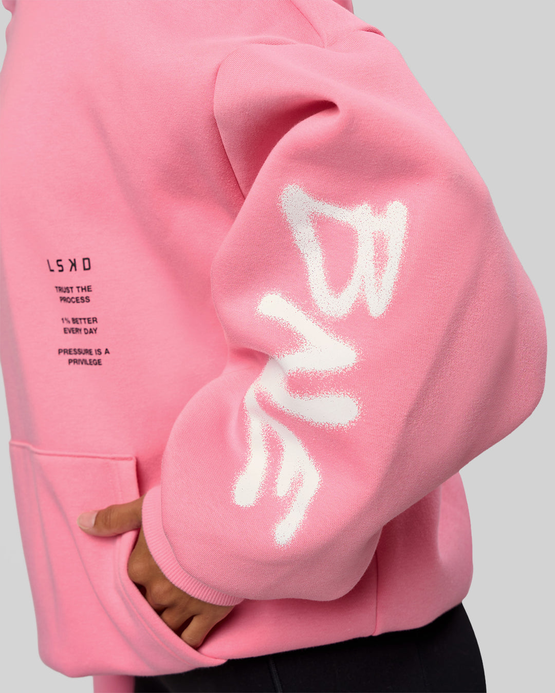 Woman wearing CFT BNE 26 Unisex Oversized Hoodie - Candy Pink-Black | Model:Brylee | Size:XS - view 14
