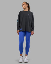 Woman wearing Cali FLXCotton Oversized Long Sleeve Tee - Black Washed | Model:Charlize | Size:XS | Thumbnail Index: 13